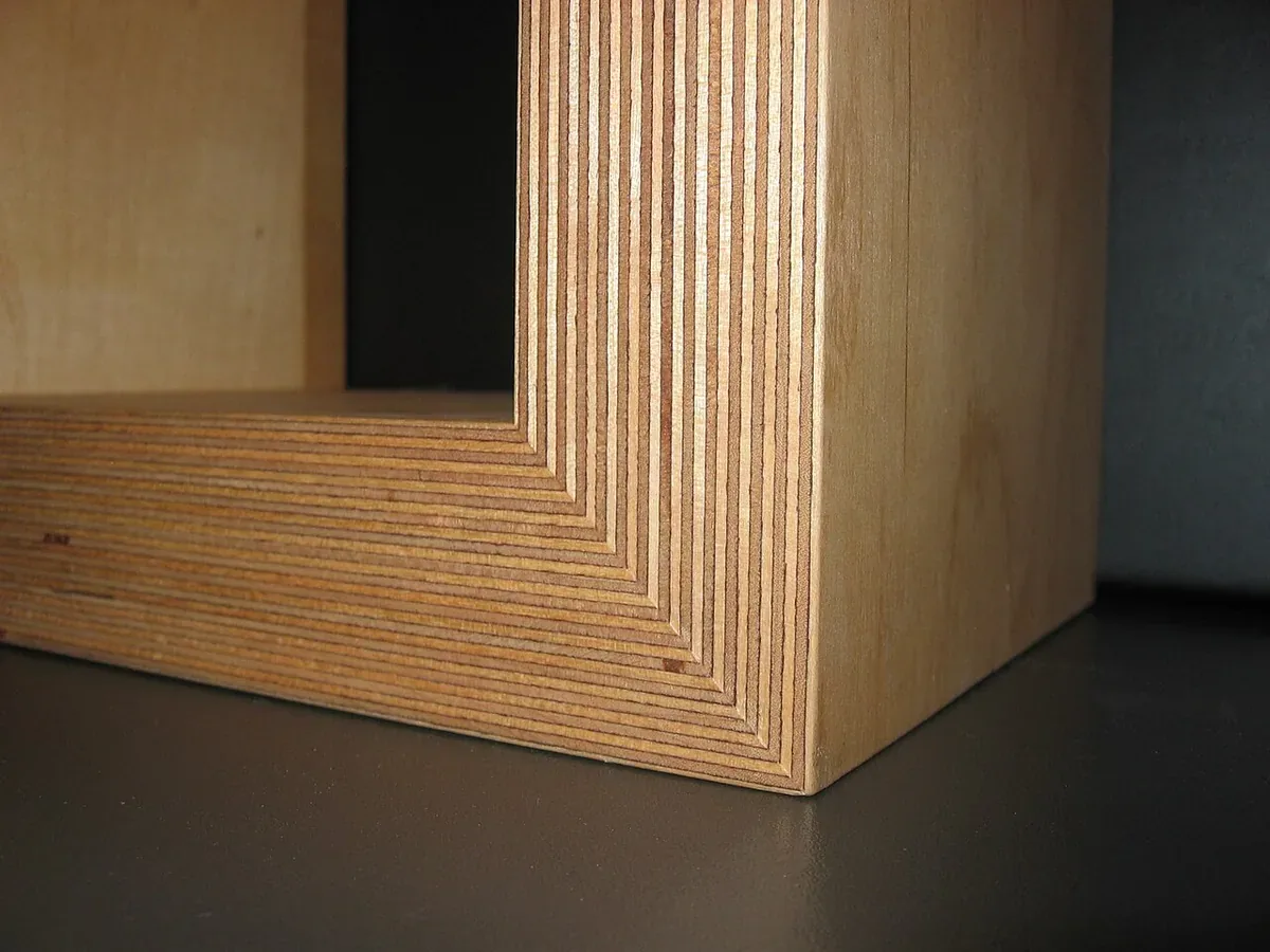 Close up of the corner of a Baltic birch plywood cabinet box showing the stacked plies at the mitred edge